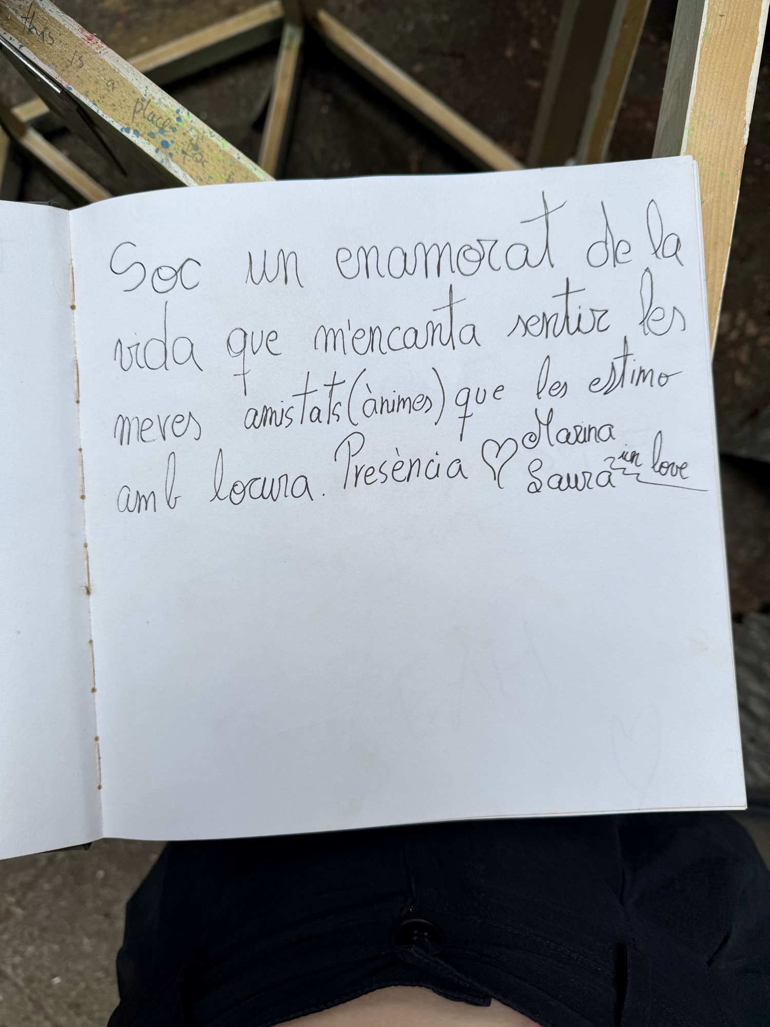 A page from the book with handwritten messages from visitors