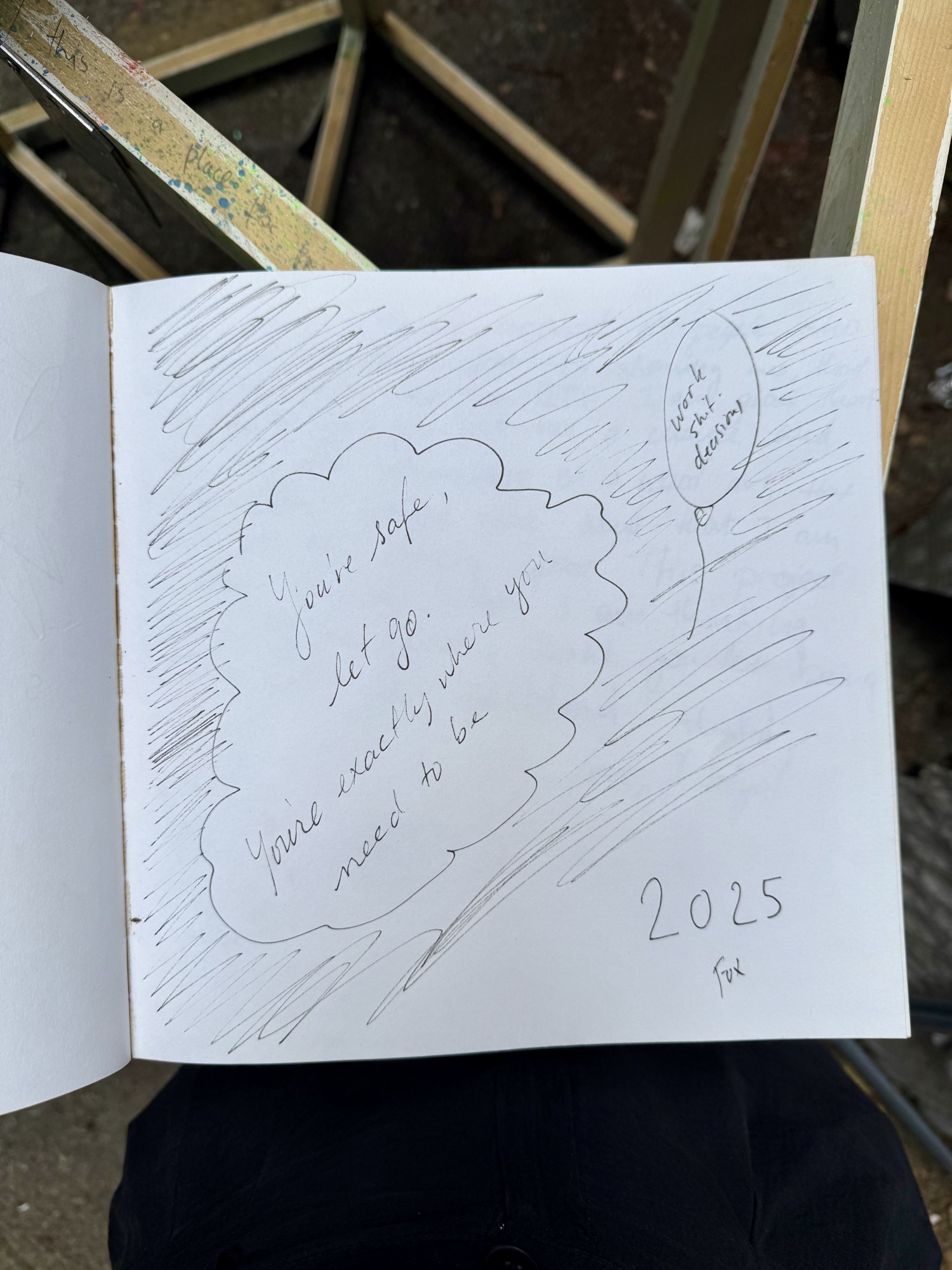 A page from the book with handwritten messages from visitors