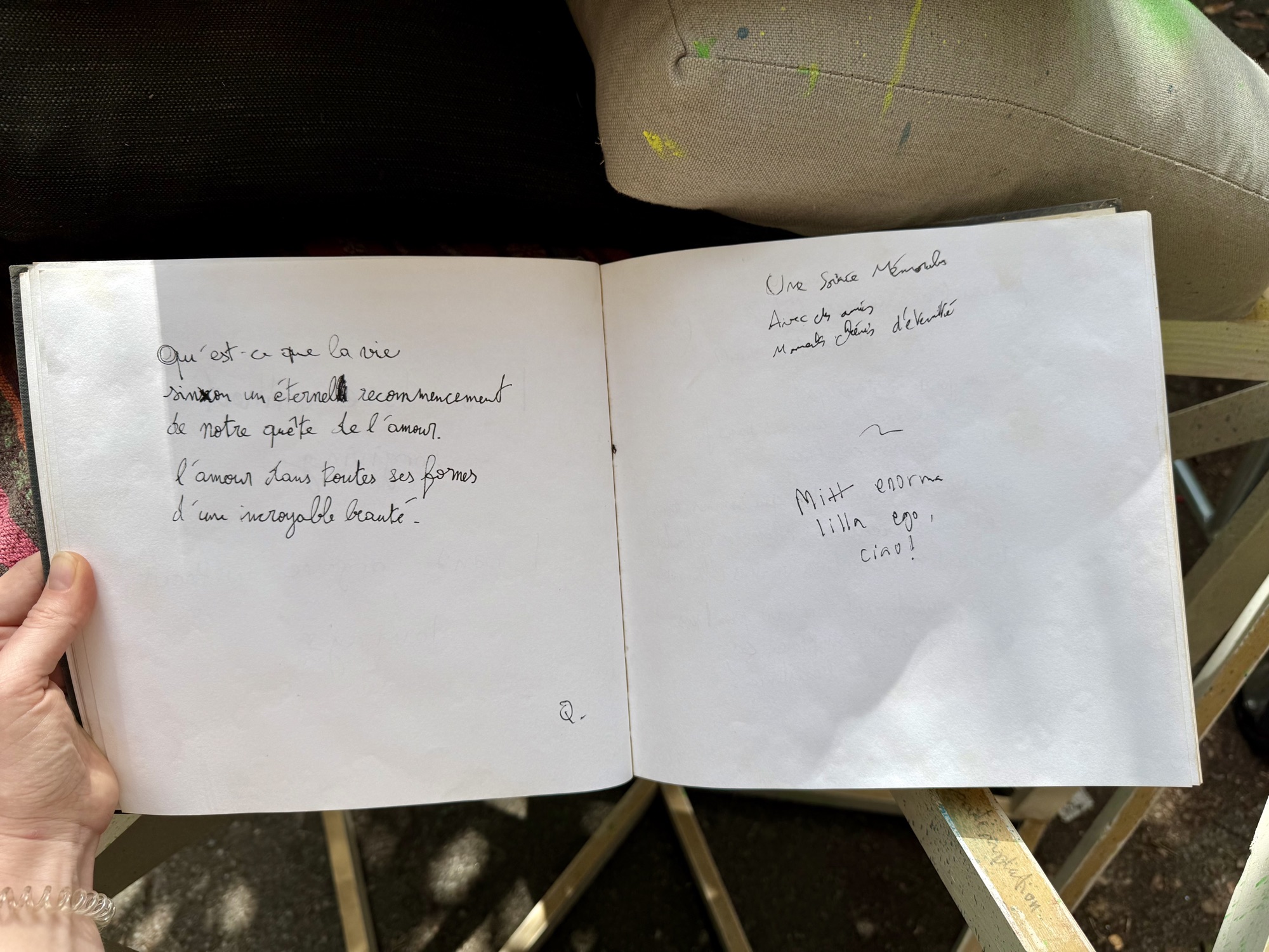 A page from the book with handwritten messages from visitors