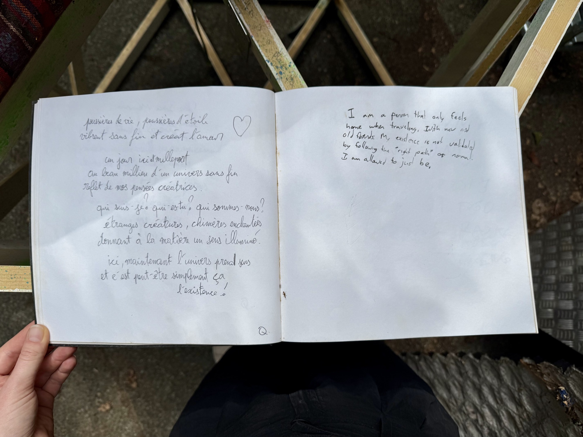 A page from the book with handwritten messages from visitors