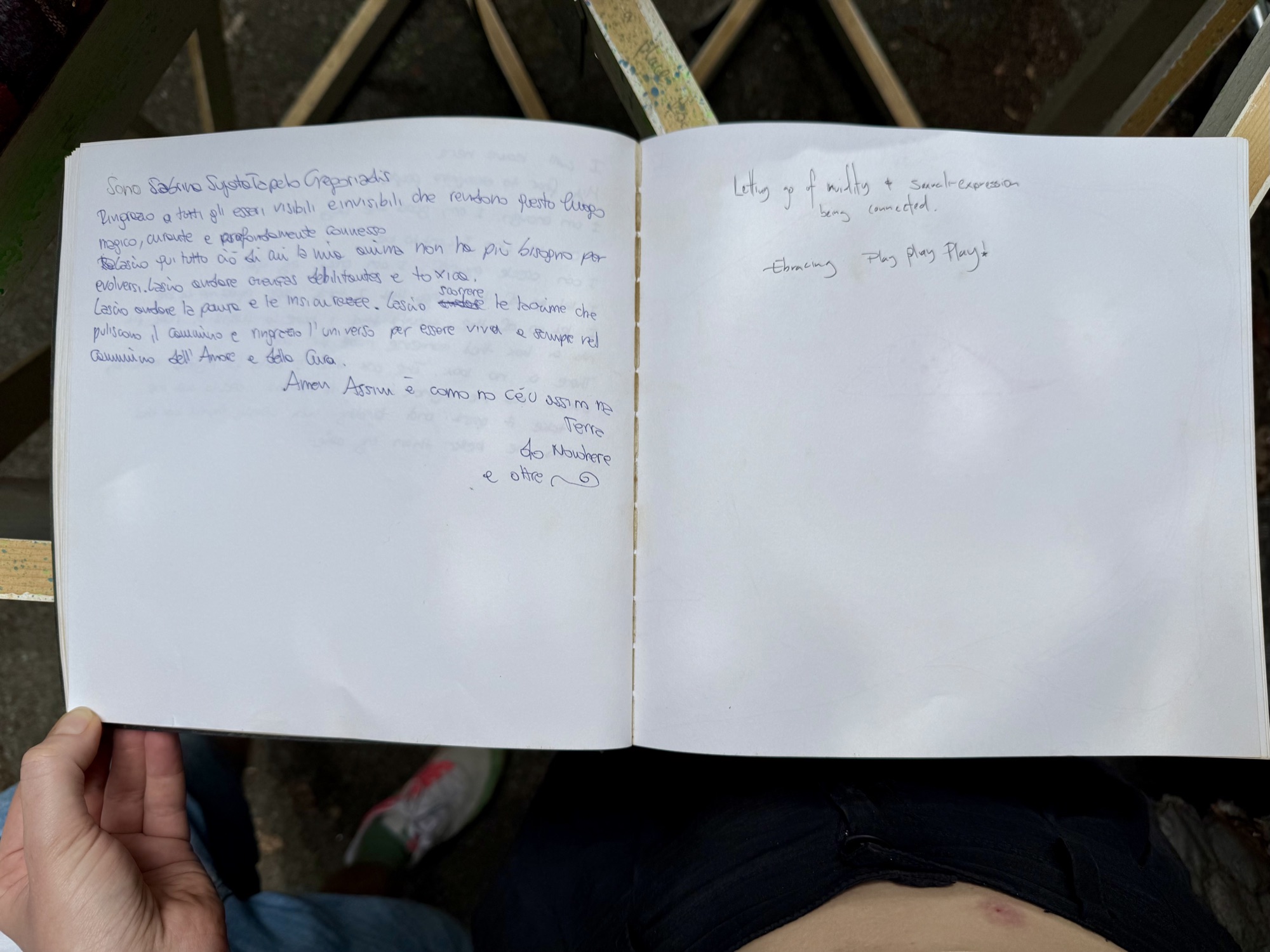 A page from the book with handwritten messages from visitors