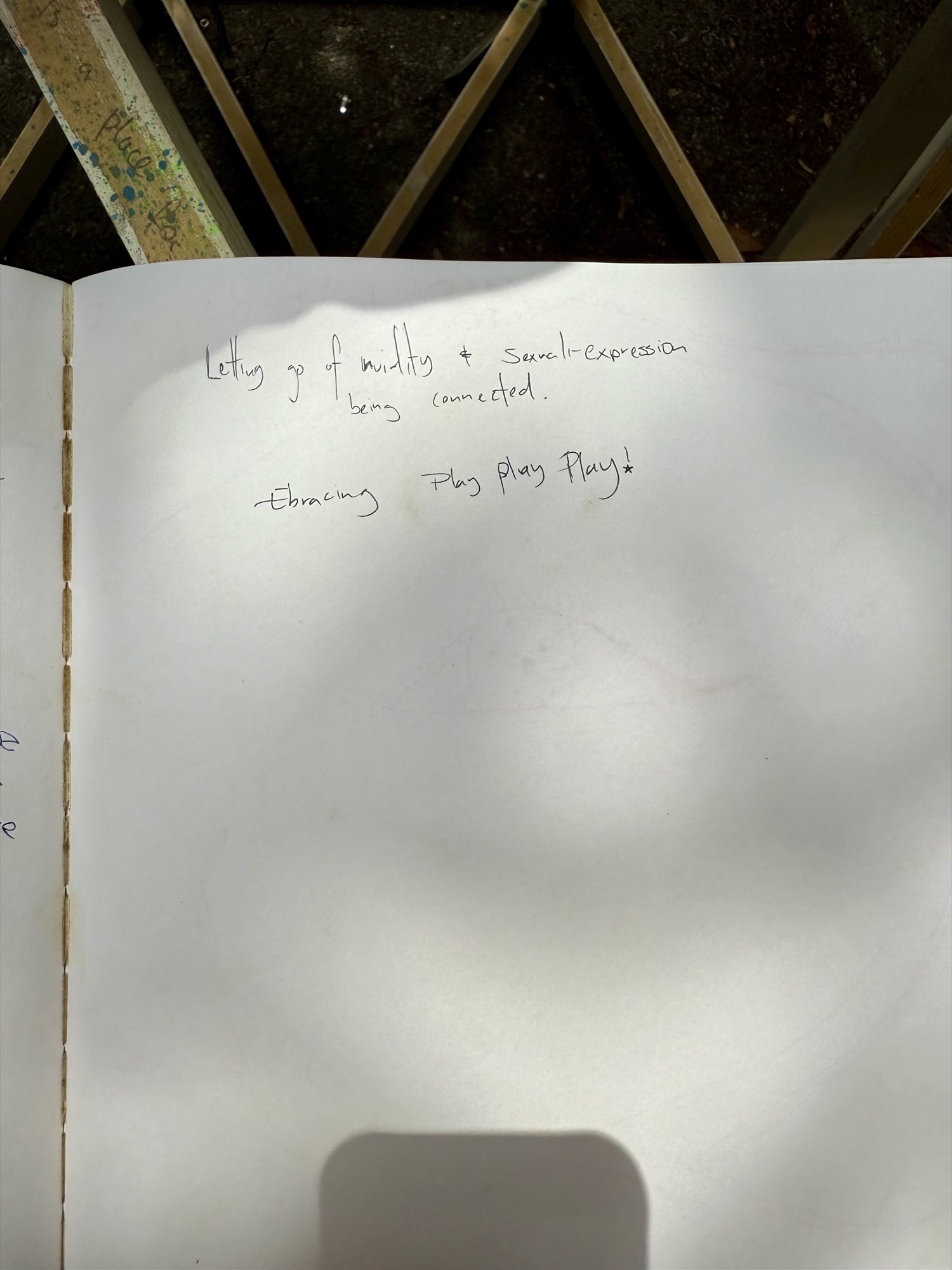 A page from the book with handwritten messages from visitors