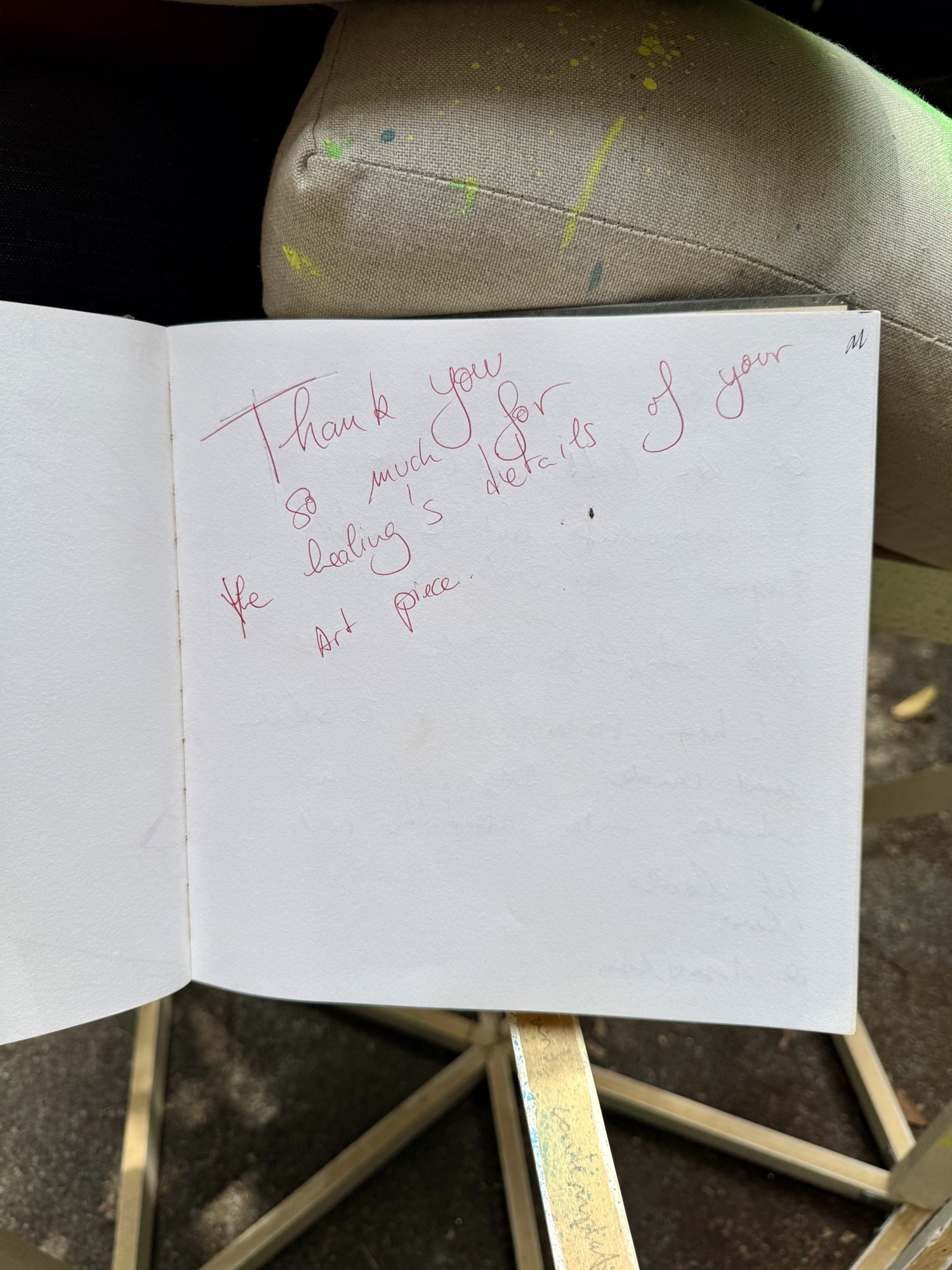 A page from the book with handwritten messages from visitors
