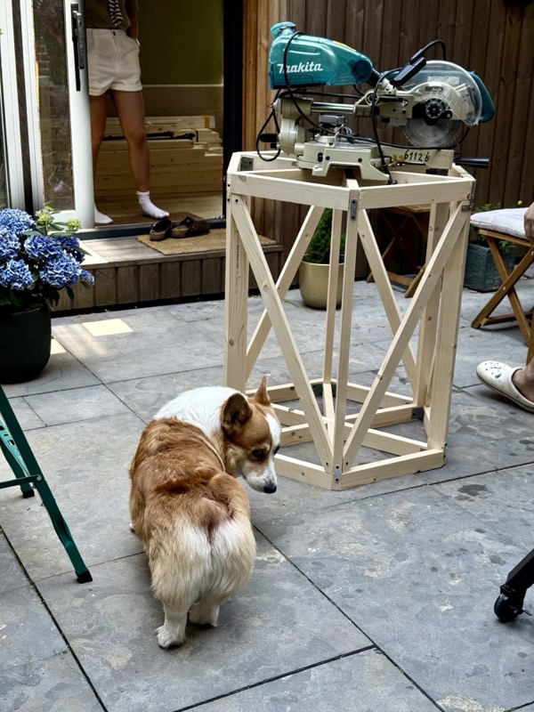 An early wooden model of the lighthouse top, with a dog