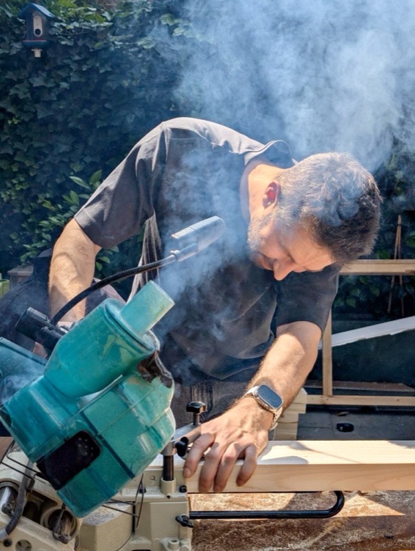 Cutting timber with a power tool