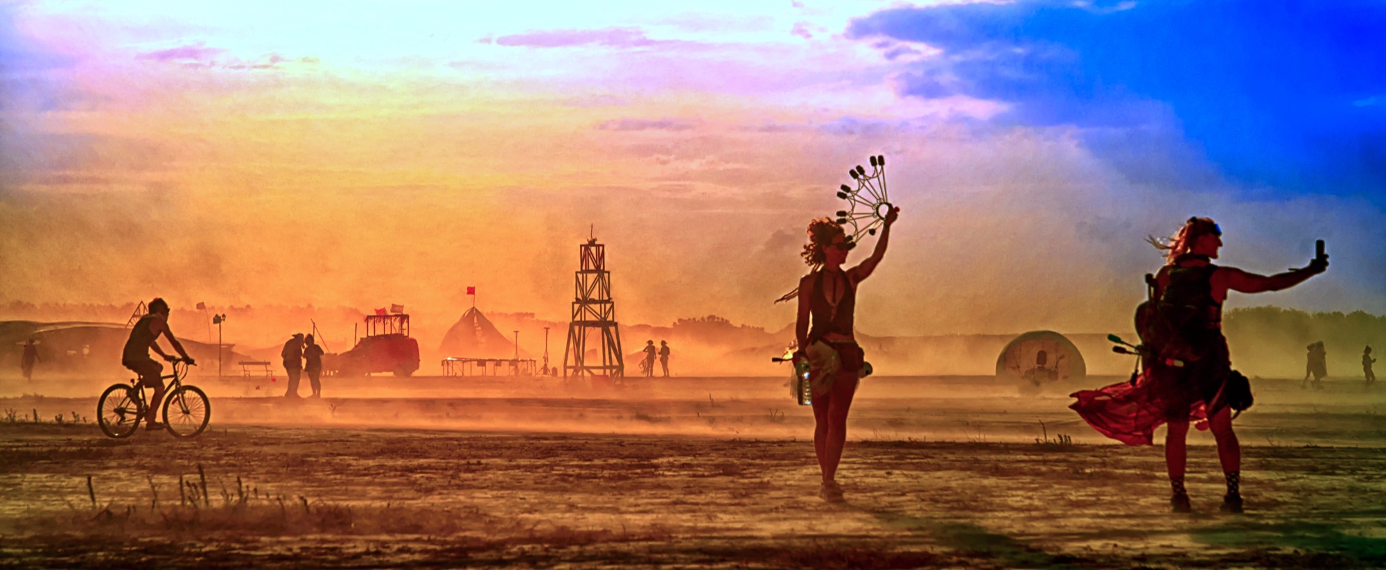 People on the playa at sunrise