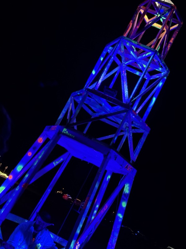 Looking up the UV-painted frame towards the beacon
